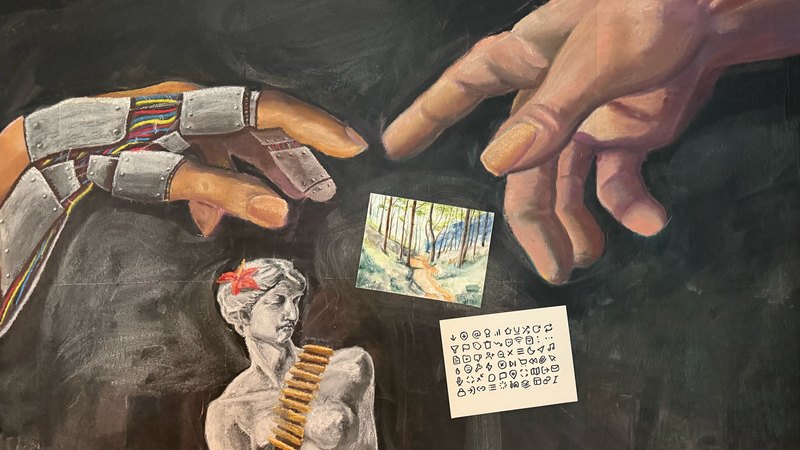 Chalk wall with painted hands reaching toward a pinned watercolor